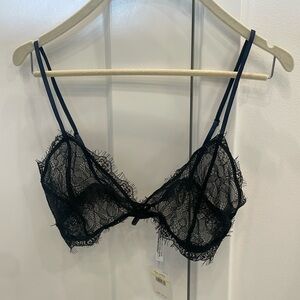 Free People black lace bralette with adjustable back closure in size Medium